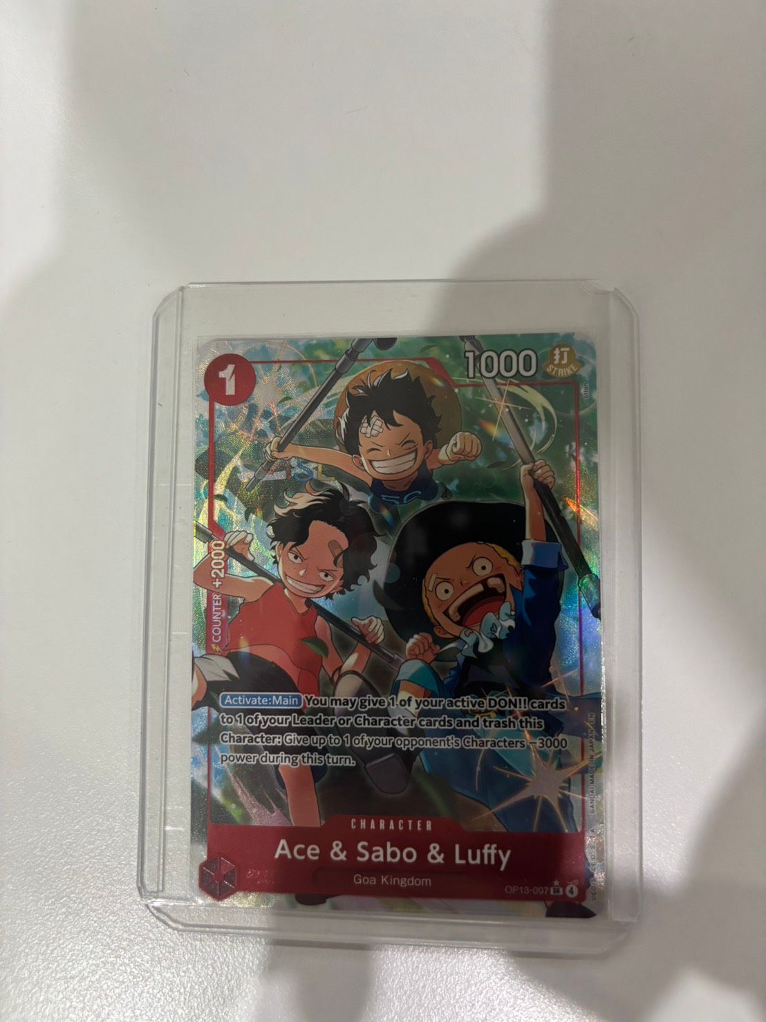 2025 ONE PIECE OP13-CARRYING ON HIS WILL ALTERNATE ART ACE & SABO & LUFFY